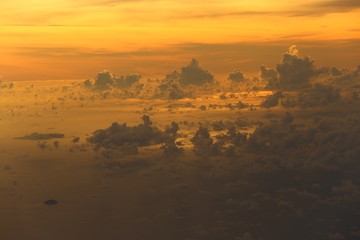 Wall Mural - Sunset White Cloud sky at high level attitude, view from window airplane