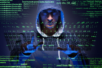 Young hacker in cyber security concept