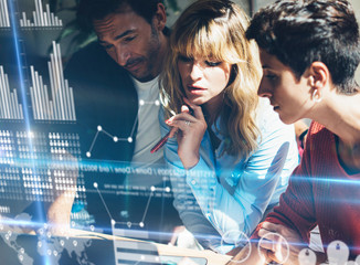 Wall Mural - young business team making discussing at office.concept of digital diagram,graph interfaces,virtual 