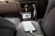 © methaphum - Charger plug phone on car.  Concept While charging, do should not use the phone may cause danger.