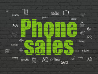 Marketing concept: Phone Sales on wall background