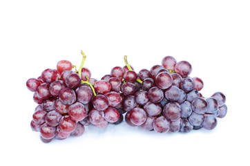 Wall Mural - Close up of Bunch of red grapes on white backgrounds