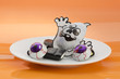 Halloween candies on white plate