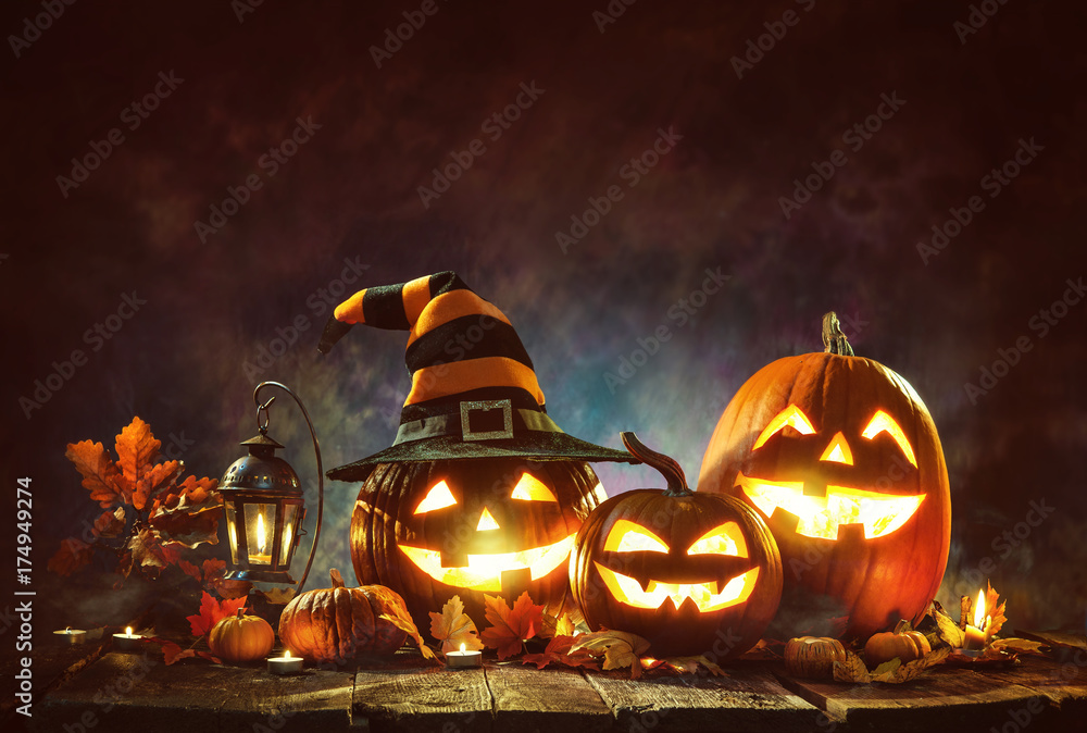 Candle lit Halloween Pumpkins - obrazy, fototapety, plakaty 
