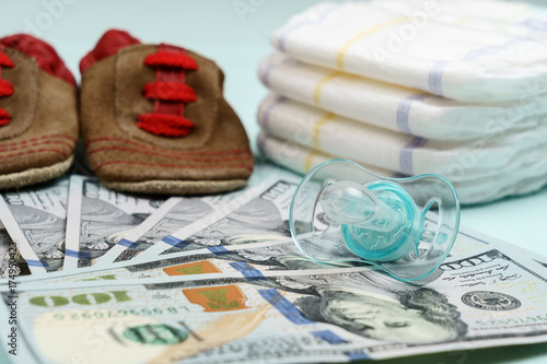 Fotografía concept of expenses and outlay for needs of newborn baby or infant