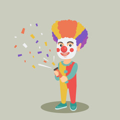 Wall Mural - Cheerful little caucasian boy in colorful clown wig and costume shooting a party popper confetti