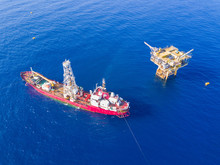 Soil Boring Boat (a Geotechnical Drilling Cum Analogue Survey Vessel) Close To A Oil Platform