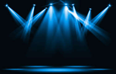 stage lights. blue spotlight strike through the darkness.
