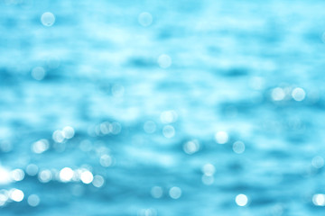 Wall Mural - blur beautiful shiny sparkling tropical blue sea beach , the fresh summer background .