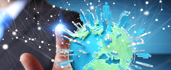 Canvas Print - businessman holding 3d rendering group of people surrounding planet earth