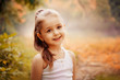 © svetabezu - Children Smiling Happiness Concept. Outdoor portrait of a cute smiling little girl.
