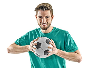 Wall Mural - one caucasian soccer player man standing holding football isolated on white background