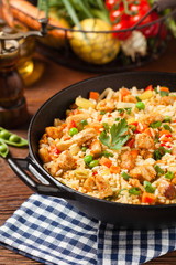 Wall Mural - Fried rice with chicken. Prepared and served in a wok.