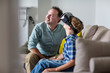 © ReeldealHD images - Boy using a VR headset game at home with Father