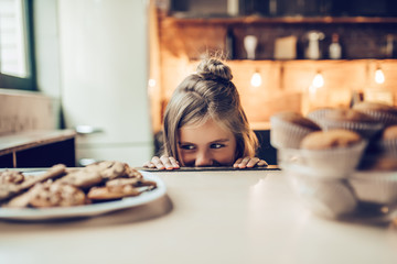 Little girl on kitchen