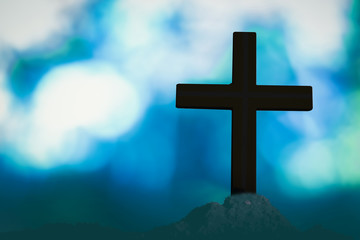 Beautiful bokeh with a cross in the background