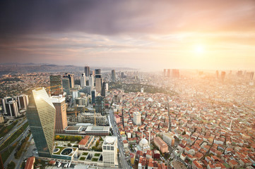 Wall Mural - Aerial view of the Istanbul city downtown with skyscrapers at sunset