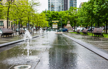 Victoria Square Metro Station Park With Fountains During Rainy Cloudy Day In City In Quebec Region