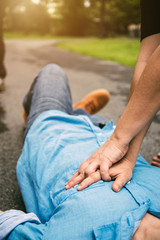 Wall Mural - Emergency CPR on a Man who has Heart Attack , One Part of the Process Resuscitation (First Aid)