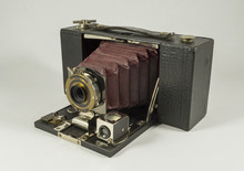 Antique Folding Pocket Film Camera With Red Bellows