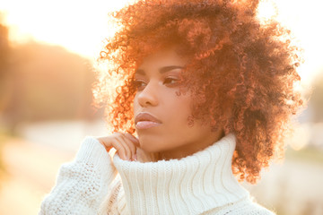 Wall Mural - Autumn portrait of african american girl.