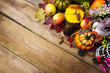 Thanksgiving arrangement with pumpkin and vegetables, copy space