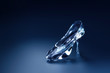 3D image of Cinderella's glass slipper on a blue background