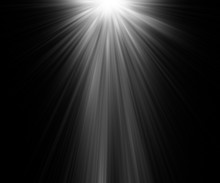 Abstract Beautiful Rays Of Light On Black Background.