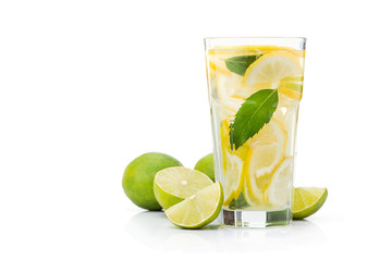 Wall Mural - fresh lime water in glass isolated