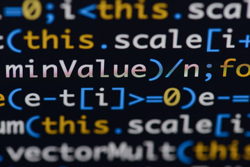 Wall Mural - real java script code developing screen. programing workflow abstract algorithm concept. closeup of 