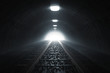 Dunkler Tunnel von Bahn mit Gleisen und Licht am Ende des Tunnels. 3d Rendering