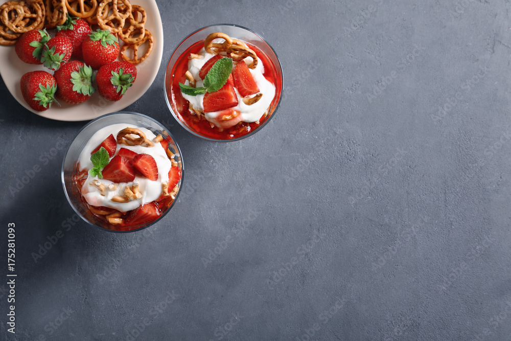 Dessert bowls with strawberry pretzel salad on table