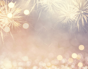 Wall Mural - gold vintage fireworks and bokeh in new year eve and copy space. abstract background holiday.