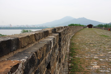 Nanjing Old City Wall with a view of the City and Mountain.  Nanjing, China. 16th, April, 2009