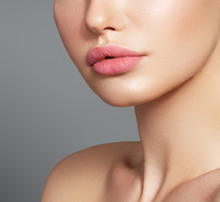 Sexy Plump Full Lips. Close-up Face Detail. Perfect Natural Lip Makeup. Close Up Photo With Beautiful Female Face