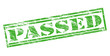 passed green stamp on white background