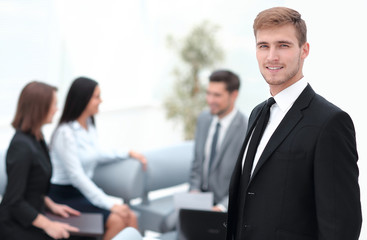 Sticker - portrait of confident businessman on background of office.