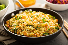 Fried Rice With Vegetables And Steamed Broccoli
