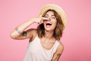 Canvas Print - Portrait of a smiling funny girl in summer hat