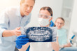© zinkevych - Close up of x ray jaws scan examined by dentist