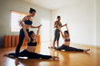 © DragonImages - Stretching girls