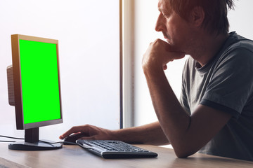 Freelancer working on home office computer