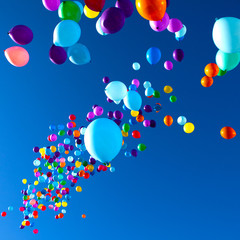 Colorful Balloons flying in the sky party