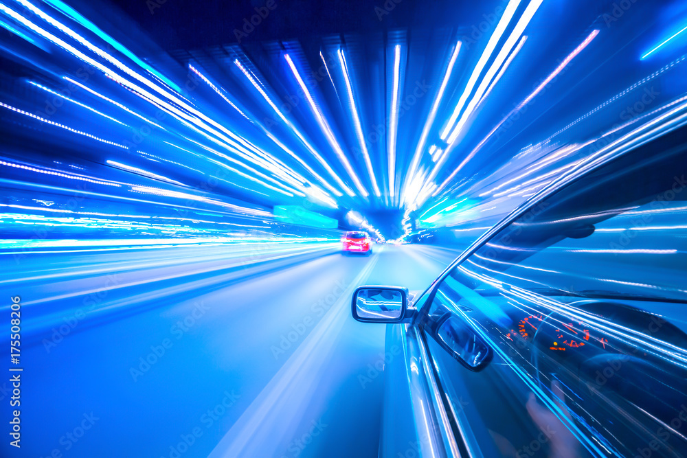 View from Side of Car moving in a night city, Blured road with lights ...