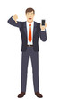 © komissar007 - Businessman with mobile phone showing thumb down gesture as rejection symbol