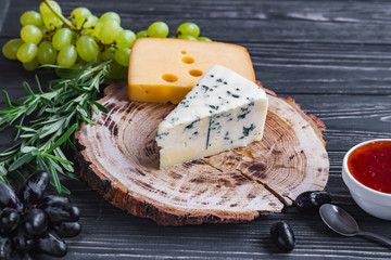 cheeses on wood are chopped deliciously and nutritionally