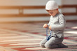 The Muslim child prays in the mosque, the little boy prays to God, Peace and love in the holy month of Ramadan.