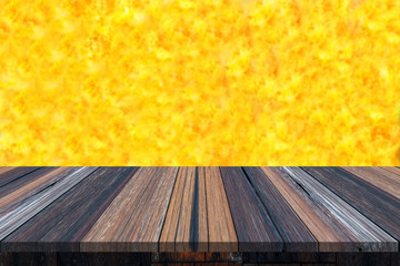 Wall Mural - Empty wooden table or plank with yellow color like a surface of sun or fire on background for product display.