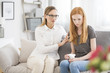 © Photographee.eu - Mother comforting unhappy teenager
