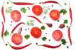 © Dmytro - mix red hot chili peppers with parsley and sliced tomato isolated on white background top view